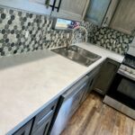 Custom Laminate Countertops and tile backsplash installation including sink and plumbing by Mr.Countertops