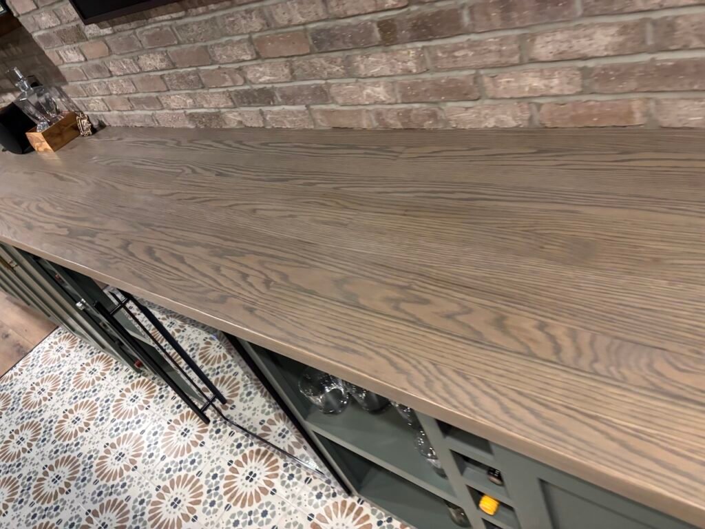 Basement Remodel with Custom Built-in cabinets and Solid Wood Counter by Mr.Countertops in NE Ohio