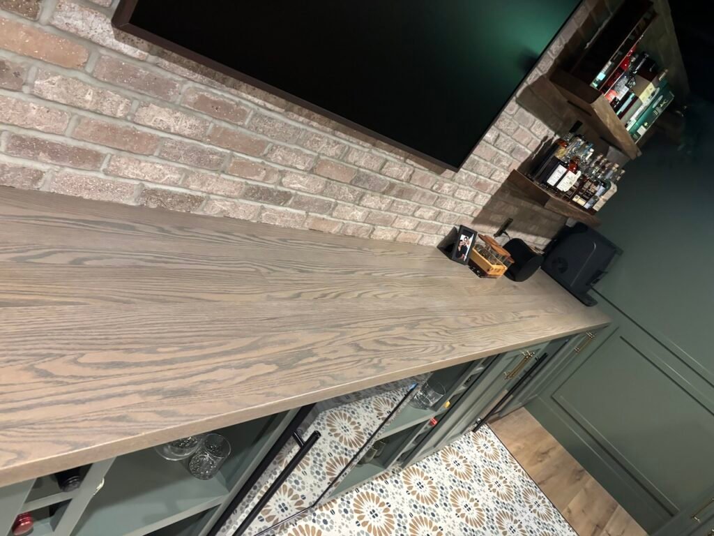 Custom Built In Cabinets with Long Custom Wood Counter by Mr.Countertops in Cleveland, OH