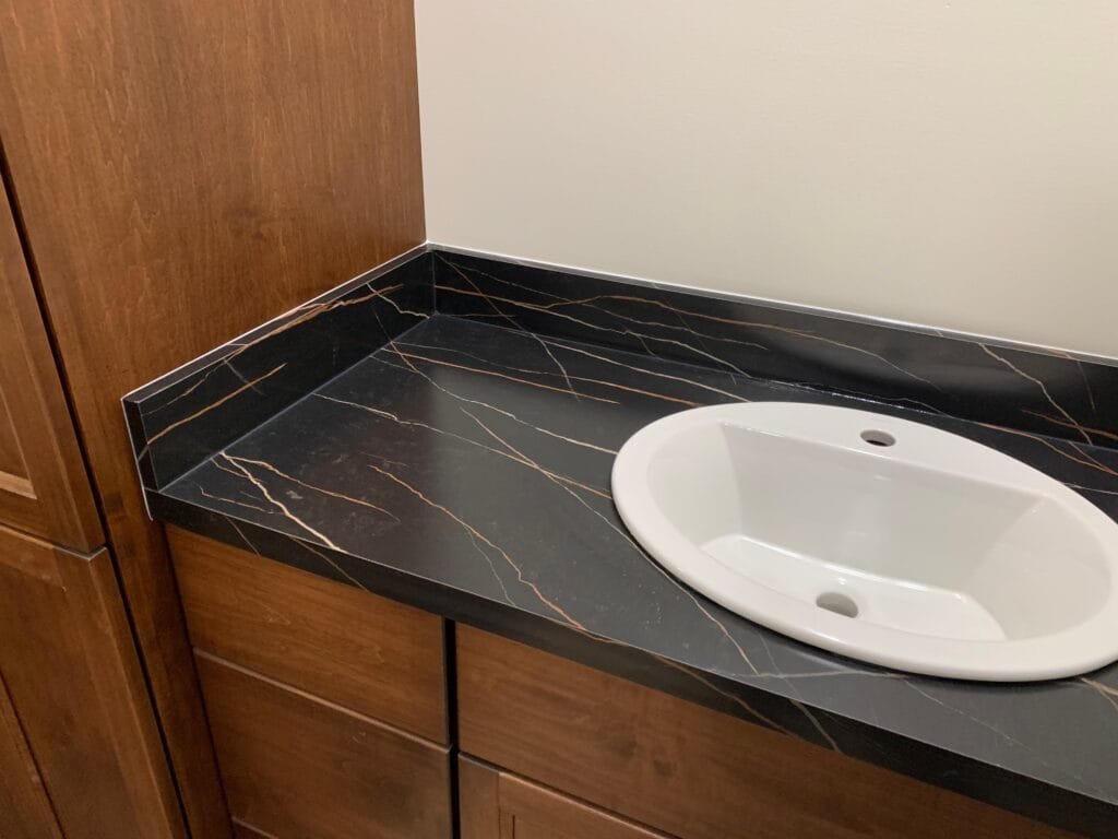 Custom Black Laminate Vanity top with white ceramic sink