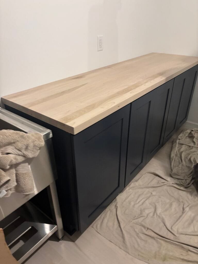 Dark Green Cabinets with Custom Wood Counter by Mr.Countertops in Cleveland, OH