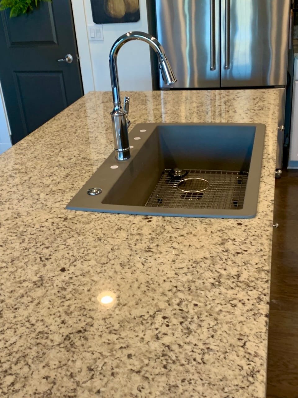 Granite Countertop with new updated sink after replacement by Mr.Countertops