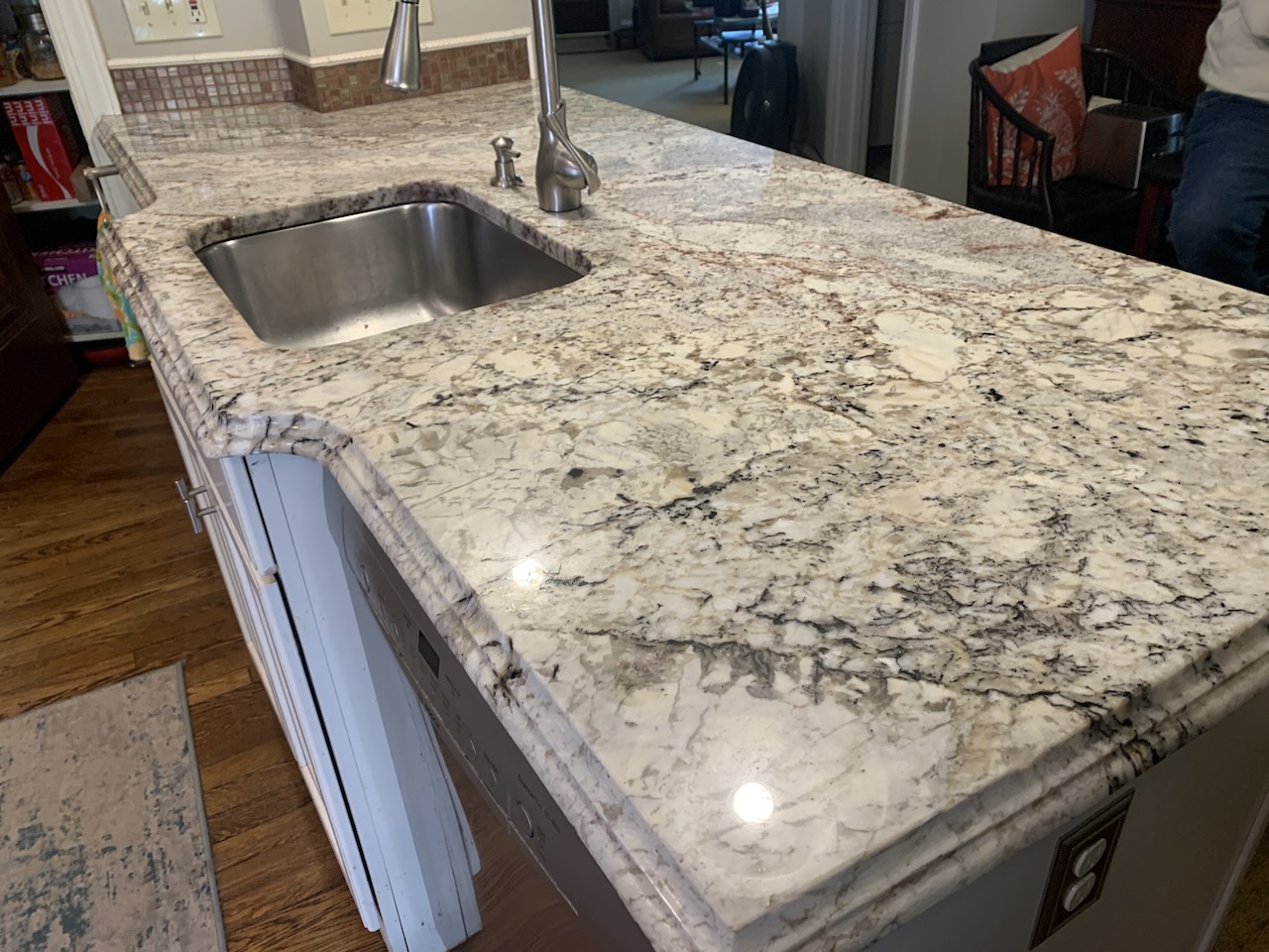 Quartz countertop resin burn removal and surface polishing