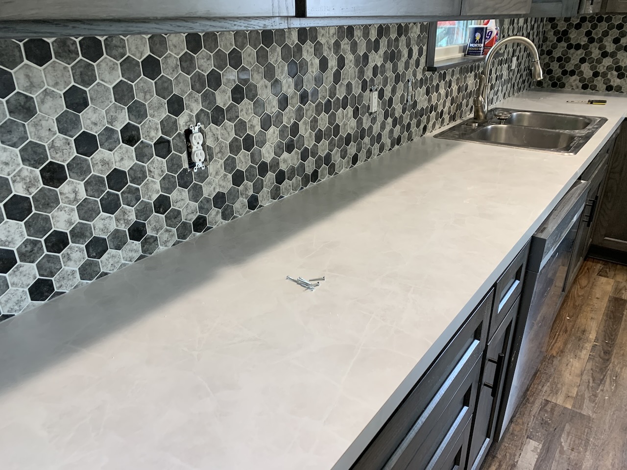 Mosaic tile backsplash installation and custom laminate countertops by Mr.Countertops in NE Ohio Kitchen