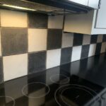 Black and white rustic tile backsplash installation in Medina, OH