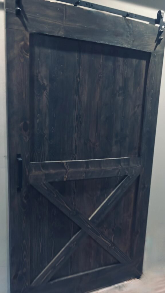 Custom Wood Barn Door with rustic finish by Mr.Countertops in Medina, OH