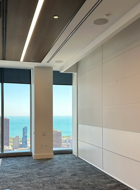 Commercial solid surface wall cladding installation in Cleveland Ohio by Mr.Countertops for durable, easy-clean wall protection.