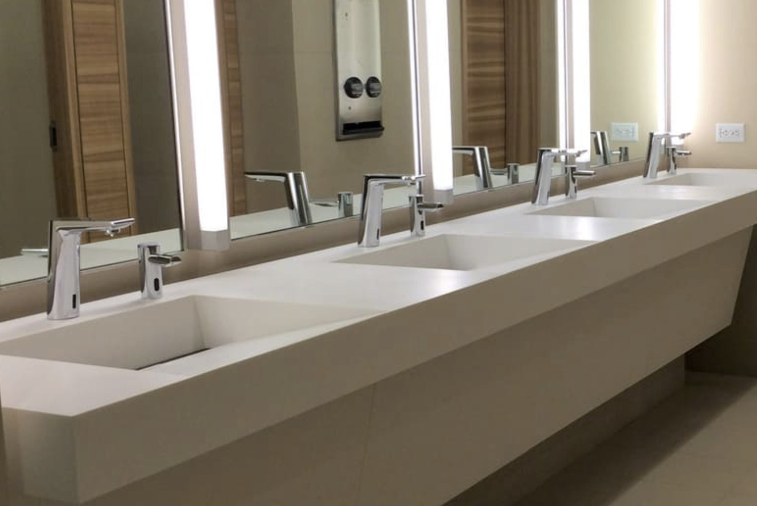 ADA Compliant Solid Surface Vanity For A NE Ohio Business.