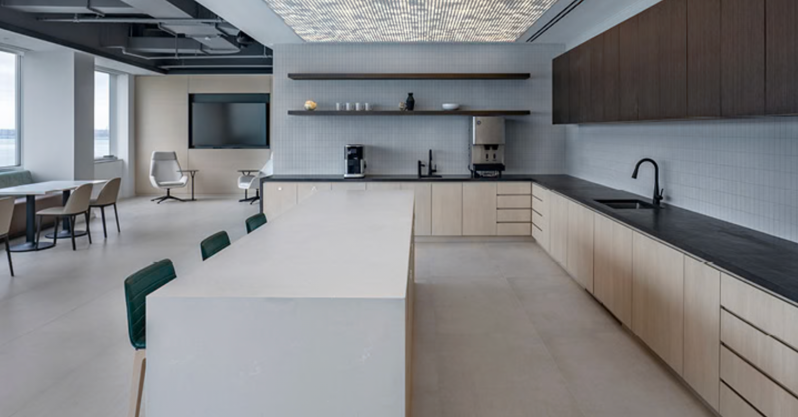 Laminate breakroom countertop fabricated for a Cleveland Ohio corporate workspace, designed for employee use and low maintenance.