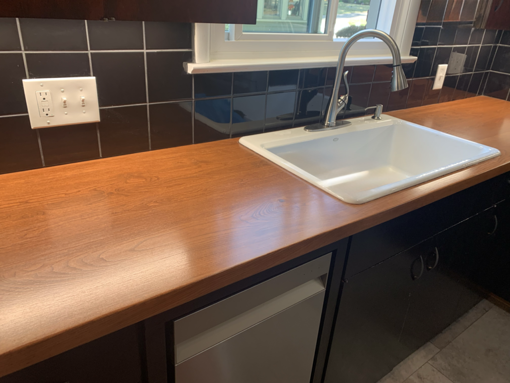 Custom Solid Oak Countertops & Stunning Black Backsplash Fabricated & installed Mr.Countertops in Wooster Ohio