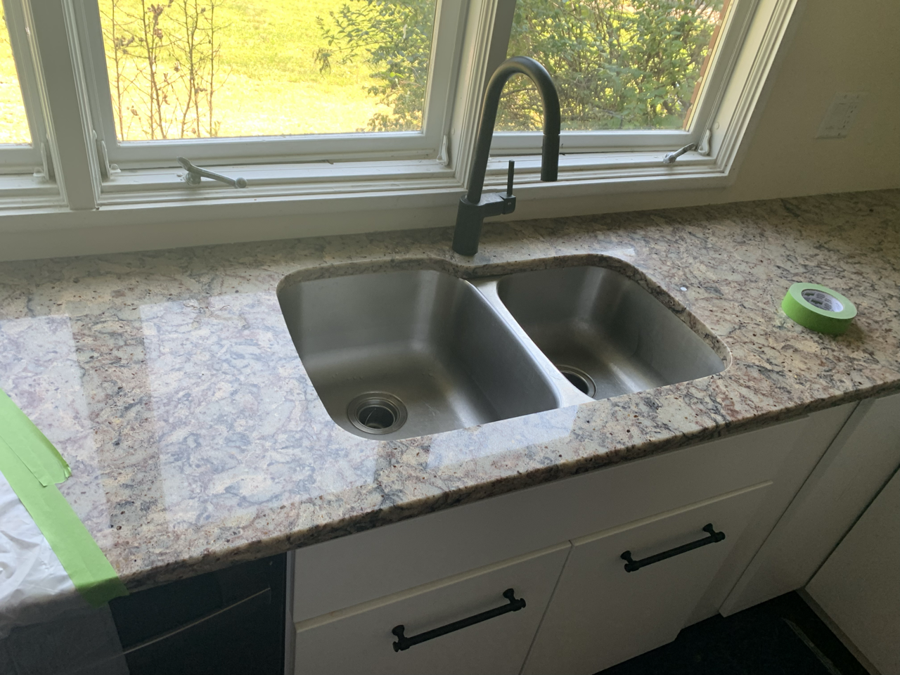 Before Image of outdated granite sink before replacement by Mr.Countertops
