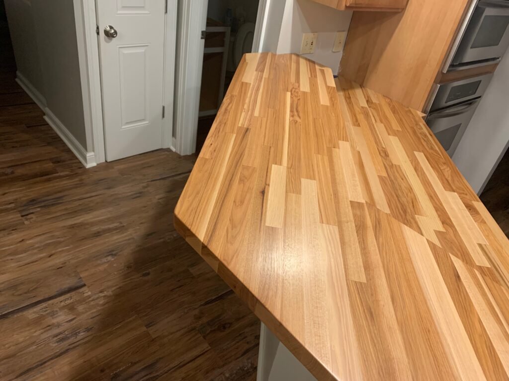 Combining the strength of oak and maple, this end-grain block is designed to be gentle on knives while standing up to heavy daily use.