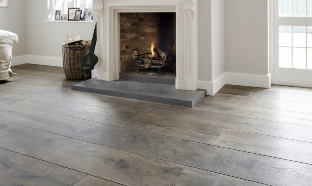 Plank Flooring in rustic living room in Medina, OH by Mr.Countertops