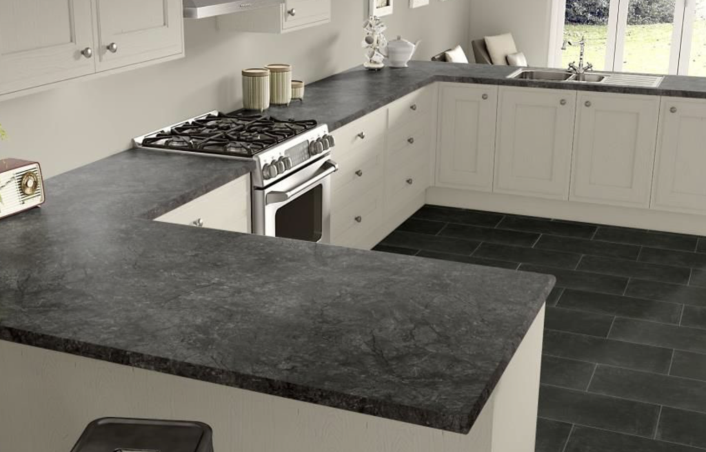 The Modern Noir Kitchen-Modern kitchen featuring textured black laminate countertops and an undermounted stainless steel sink