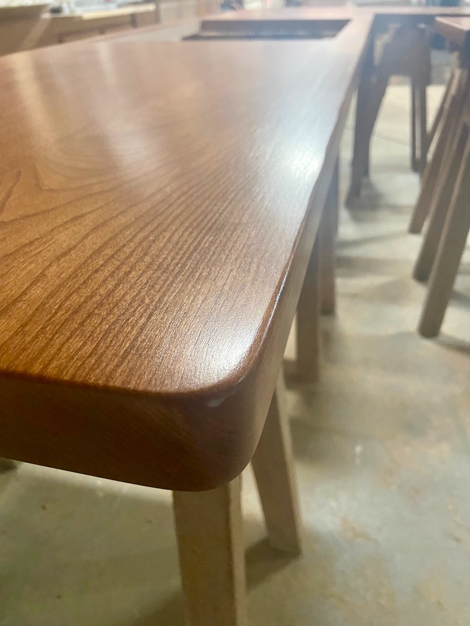 Close-up of our handcrafted wood countertops in our shop in Wadsworth Ohio after Mr.Countertops applied the first protective coat of finish.
