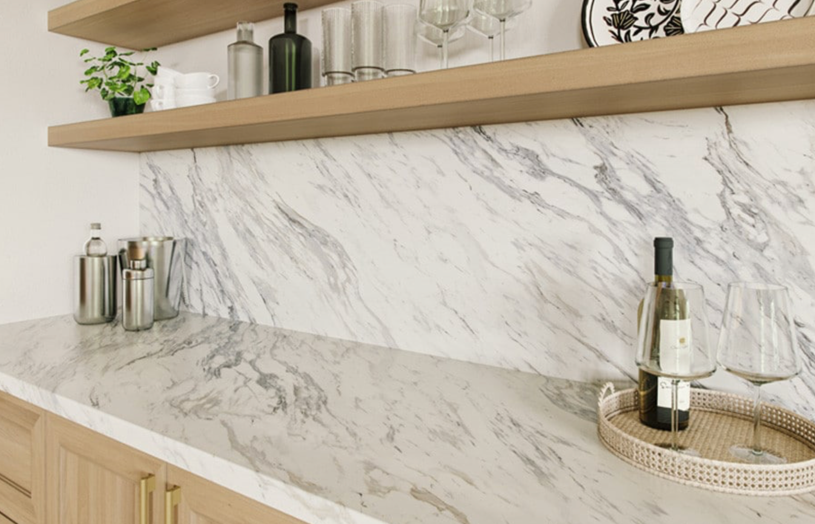 White and gray marble-pattern laminate wine bar with matching full-height backsplash and oak floating shelves.