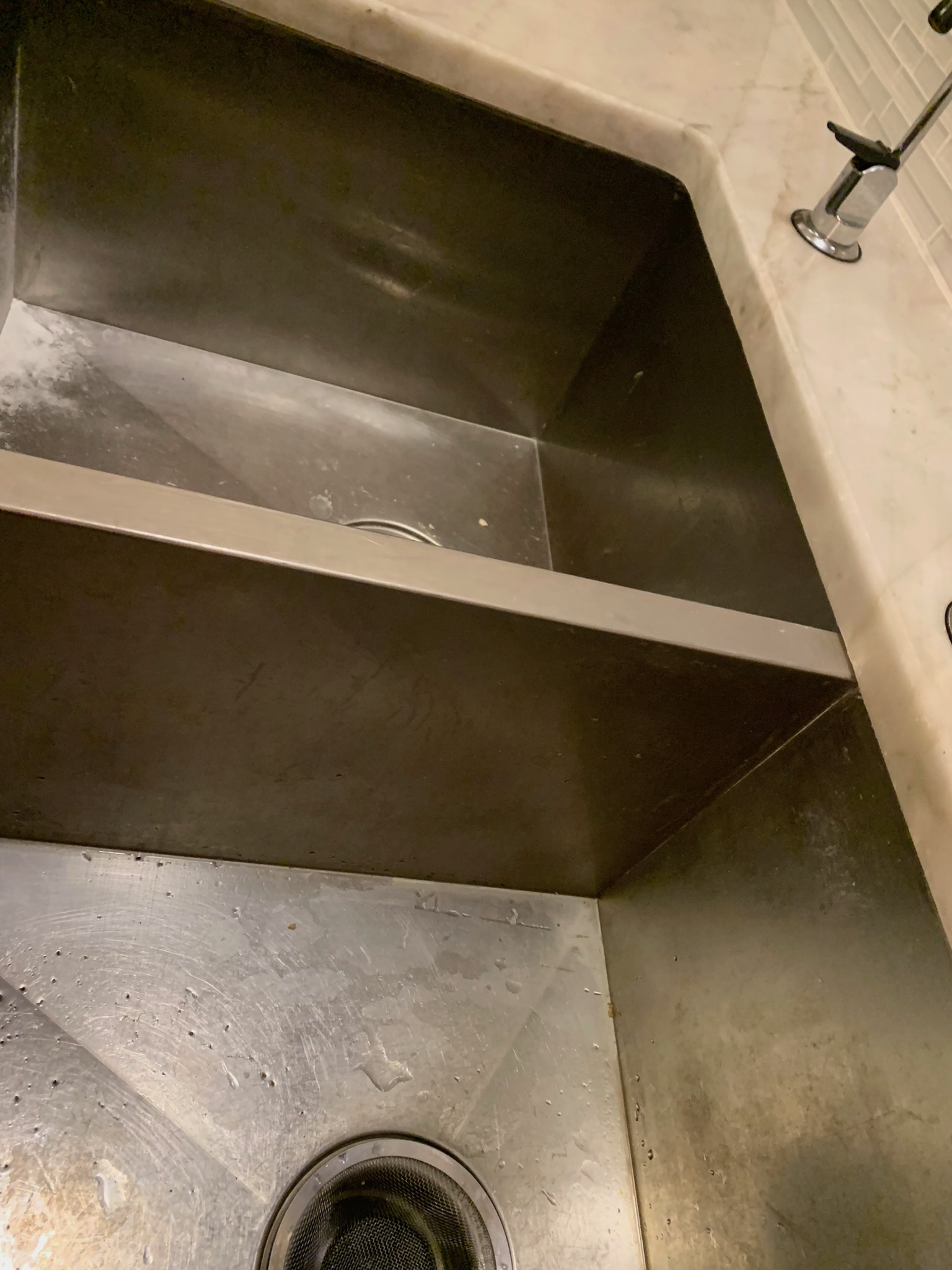 Undermount sink clip repair and granite reinforcement Cleveland---Is your sink pulling away from the stone? Don't wait for a leak. We reseal and mechanically reinforce the mounting so it's rock solid. 