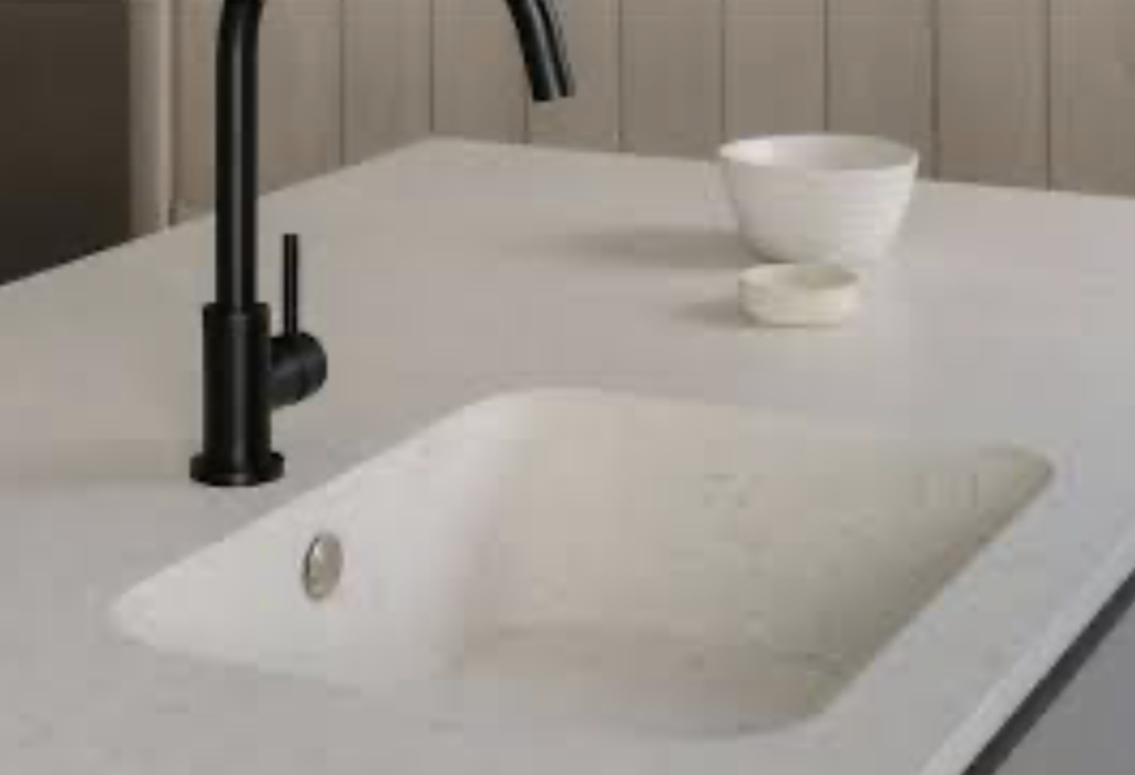 Seamless kitchen island with a color matched integrated sink from Mr Countertops in Pepper Pike, Ohio.