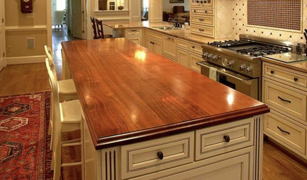 Custom American Cherry wood countertop with a smooth satin finish, showing natural reddening over time.