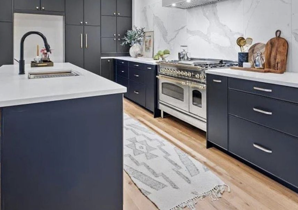 Custom Corian Countertops with Navy Cabinets in Northeast OH