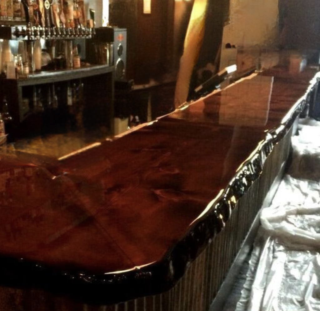 Commercial Bar top in Cleveland Ohio with alcohol and waterproof finish by Mr.Countertops.