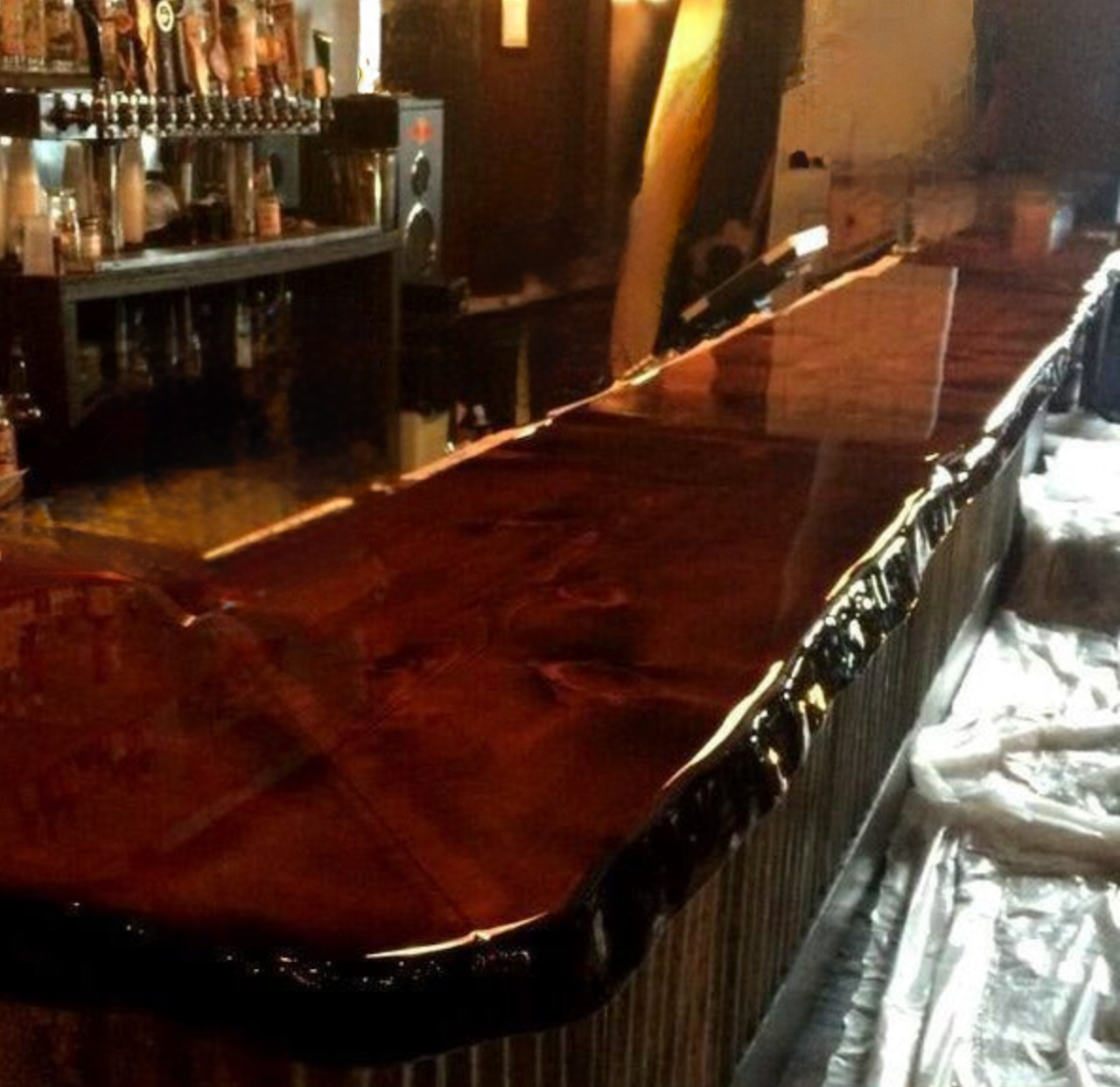 Commercial Bar top in Cleveland Ohio with alcohol and waterproof finish by Mr.Countertops.