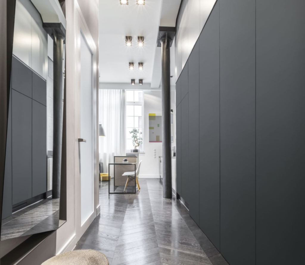 Sleek Modern Laminate Wall Paneling in Modern Living room hallway.