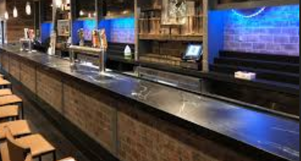 Sleek and Seamless Corian Bar For Commercial Bar in Cleveland, OH