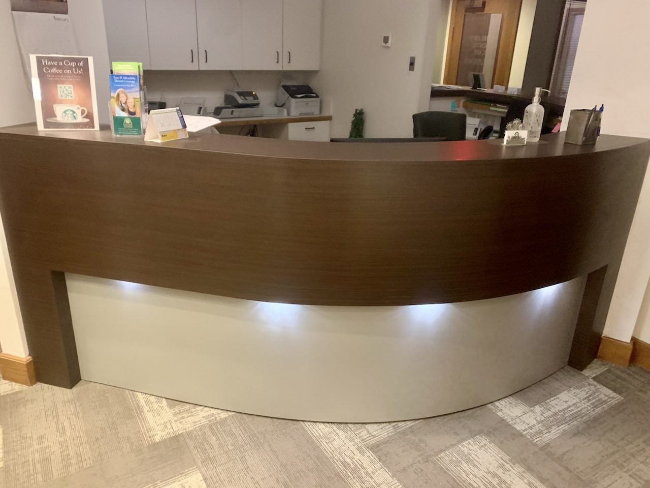Custom Reception Post for Fairlawn Dental including cabinet lighting. | Mr.Countertops
