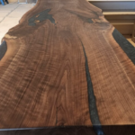 Deep Tones, Infinite Depth, This Cleveland bar build showcases the power of Exotic Sapele. Those long, dark ribbon stripes aren't just a pattern, they are the natural pulse of the wood, polished to a mirror-like sheen for the ultimate home entertaining experience. | Mr.Countertops