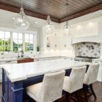 Modern Kitchen with ever after island and seating by Mr.Countertops