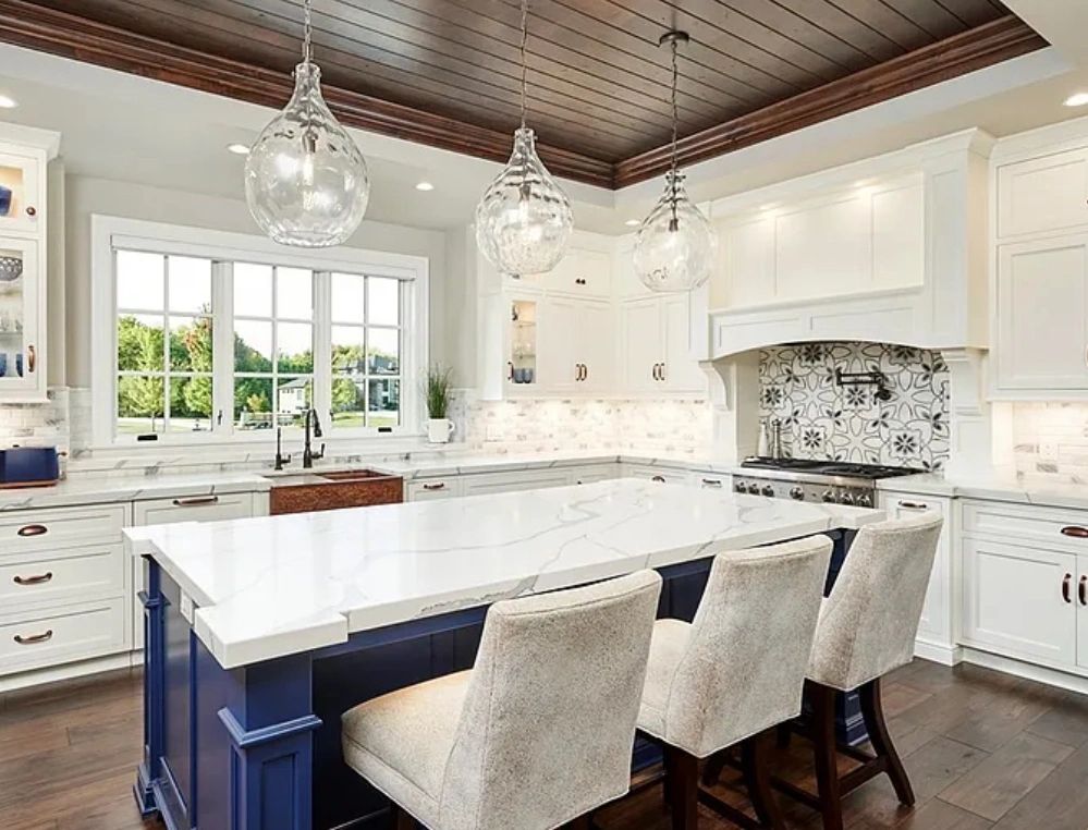 Modern Kitchen with ever after island and seating by Mr.Countertops