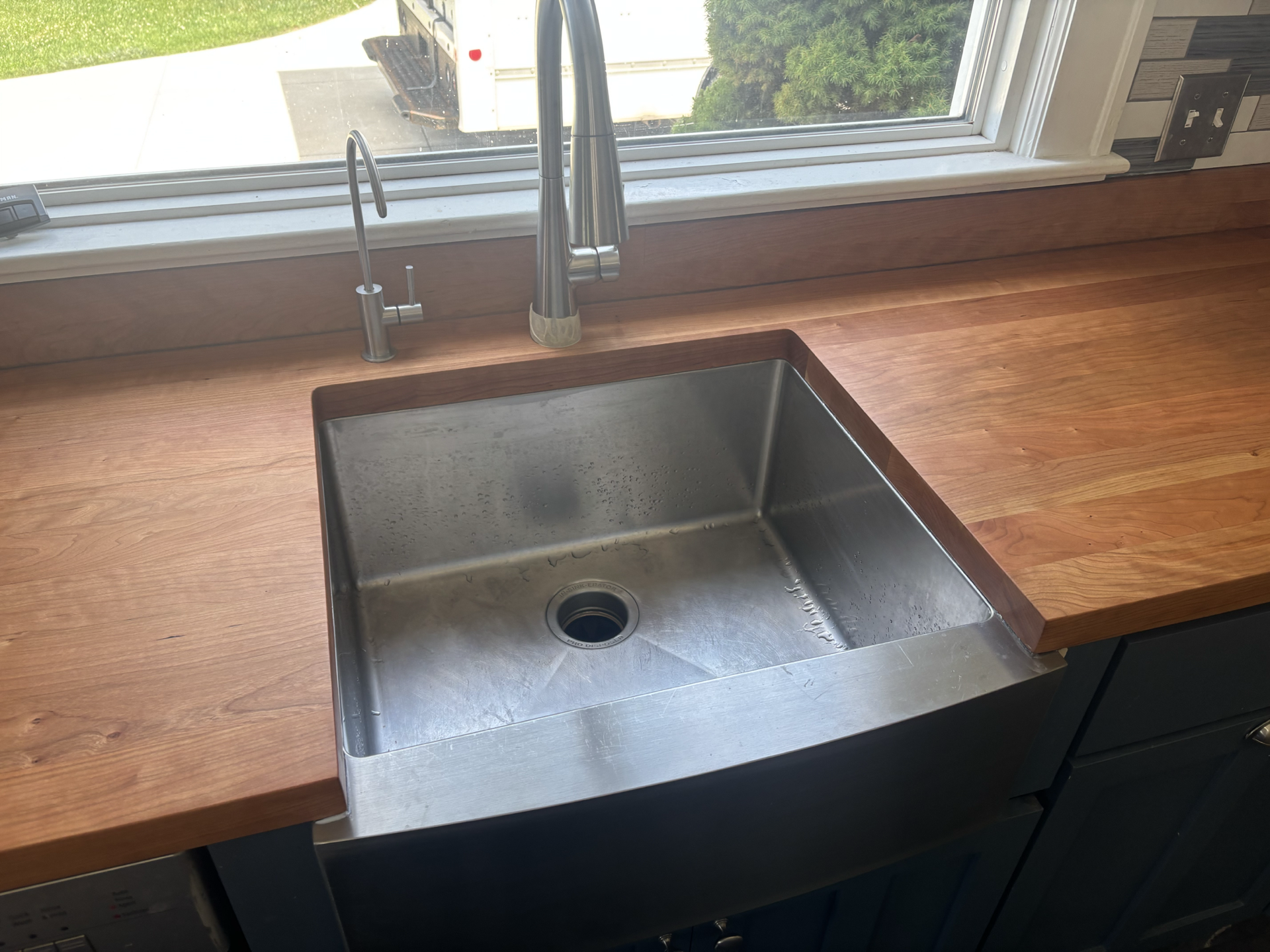 Custom walnut countertops with Undermount apron, front sink, faucet, and plumbing | Mr.Countertops