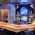 Stunning live edge bar made with wood slabs, and food safe finish | Mr.Countertops
