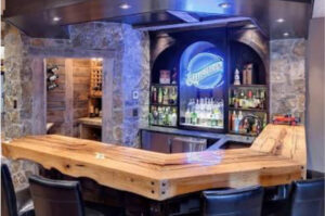 Stunning live edge bar made with wood slabs, and food safe finish