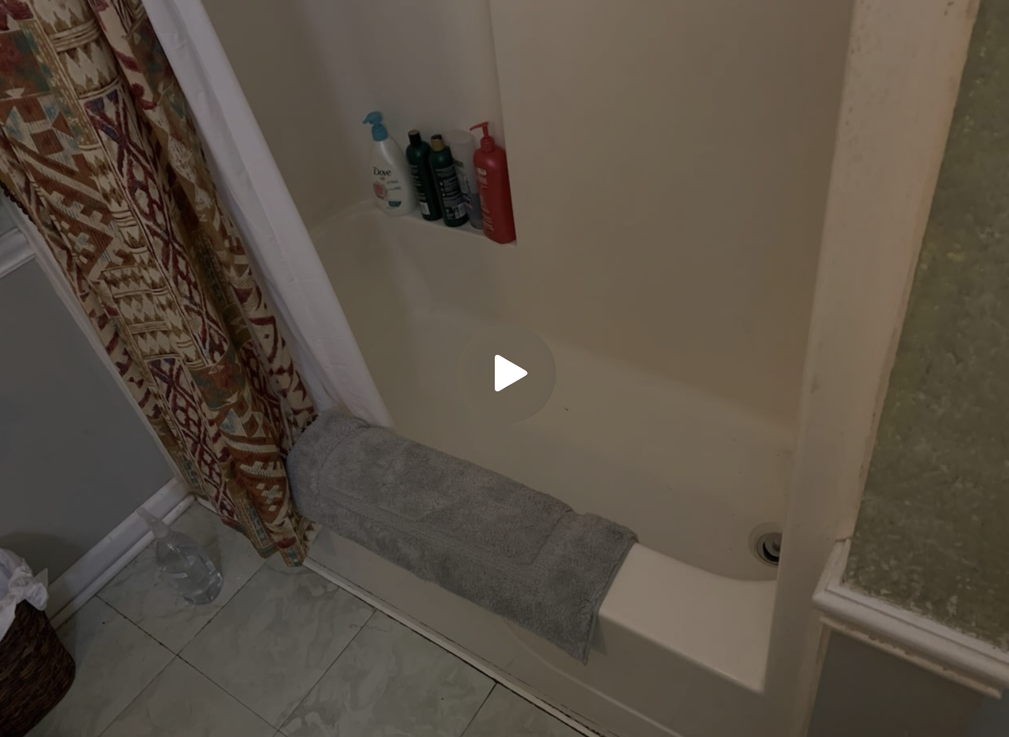 Click to watch this bathroom transformation featuring custom shower by Mr.Countertops