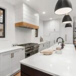 White Solid Surface Island in Modern Farm style kitchen Remodel | Mr.Countertops