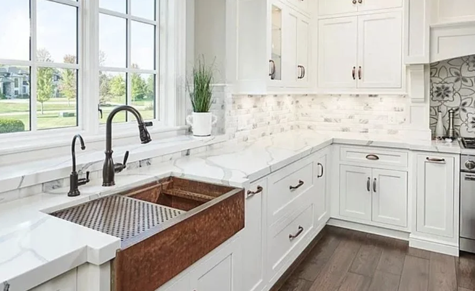 White solid surface countertops, cabinets and tile in Medina, OH