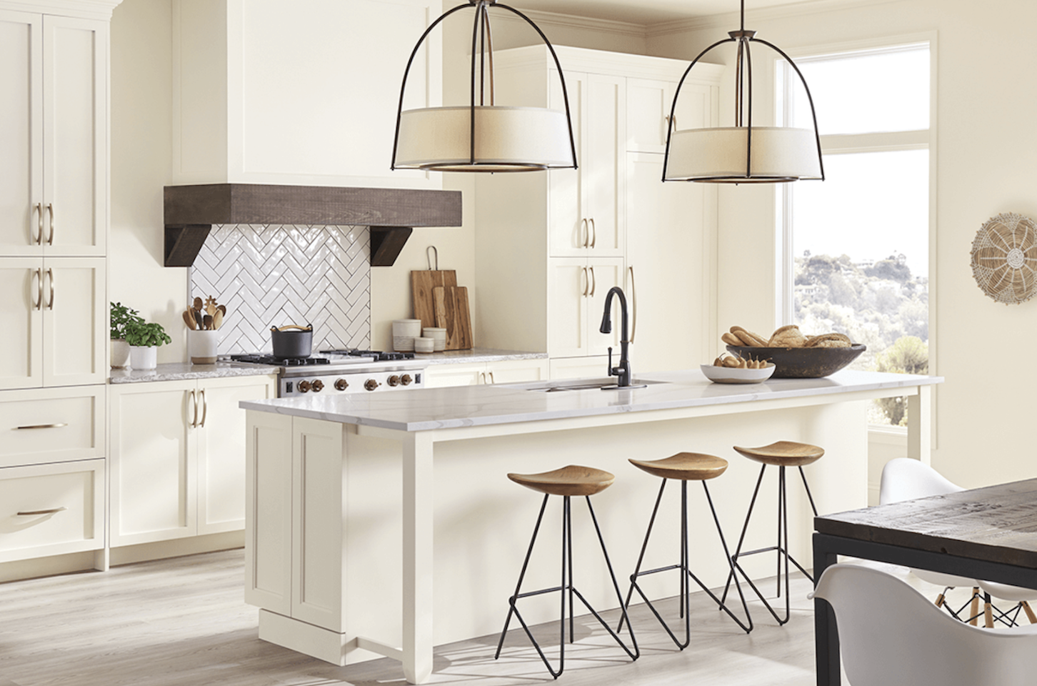 Contemporary Kitchen remodel with herringbone tile backsplash and sit at island