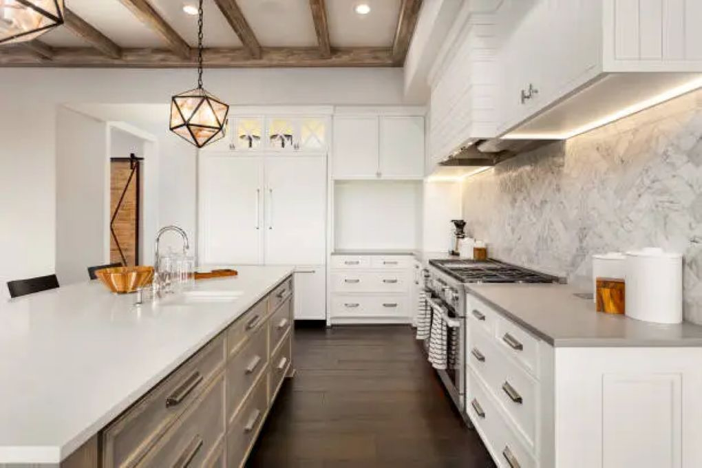 Custom Solid Surface Countertops and seamless backslash in modern NE OH kitchen remodel